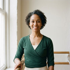 Erin M., recreational ballet teacher, in an empty studio